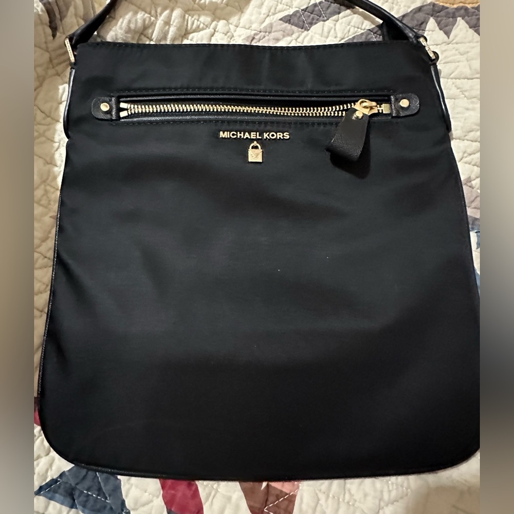 Micheal Kors black cross over bag new with tags
